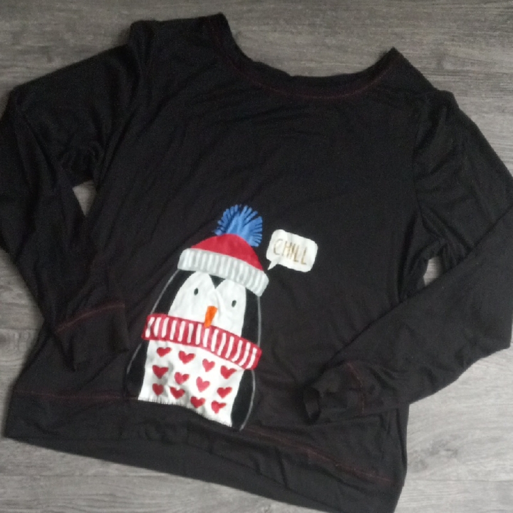Black Penguin Sweater with Red and Blue Accents